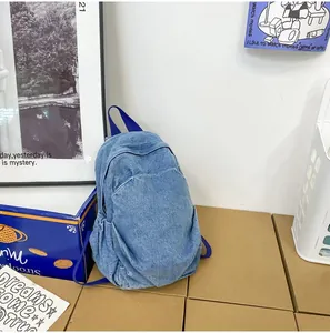 Elegante mochila de mezclilla lavada azul vintage para mujer, mochila casual moda