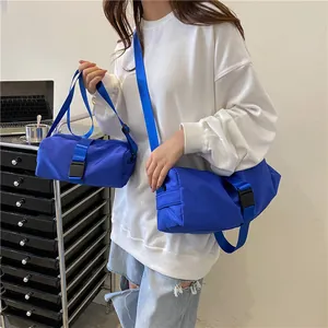 Bolso bandolera de tela oxford azul de gran capacidad con estuche pequeño para viaje