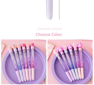 Detailed macro view showing various styles of cute cartoon liquid quicksand gel pens.