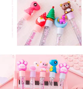 Detail showing cute cartoon liquid sand glitter pens with 3D dinosaur and unicorn toppers