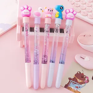 Creative liquid glitter gel pens with cute cartoon toppers and purple sparkle effect