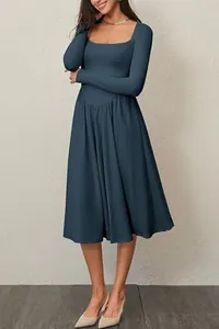 Full body view of a navy blue long sleeve square neck pleated midi dress on a model
