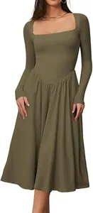 Close-up showing the elegant fit of an olive green square neck pleated long sleeve dress