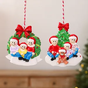 Personalized resin Christmas family ornaments with festive wreath and tree designs