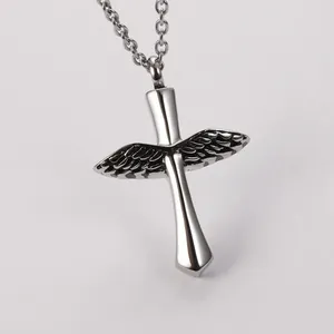 Openable cremation urn necklace features a stainless steel cross with vintage angel wings.