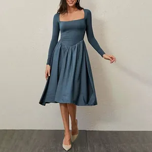 Elegant long-sleeved midi dress with a square neckline and pleated skirt