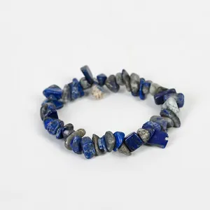Natural blue lapis lazuli crushed stone stretch bracelet with irregular gray beads