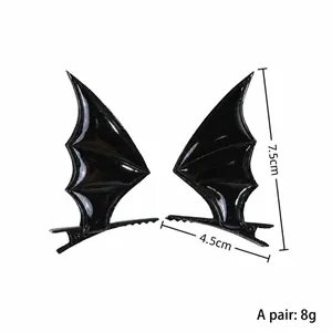 Guide détaillé des tailles pour les pinces à cheveux ailes de chauve-souris noires.