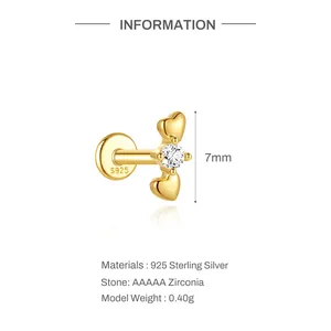 Close-up detail of 925 sterling silver gold-plated heart stud with AAAAA zirconia