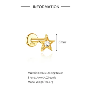 Detailed view of a 5mm gold star stud earring made of 925 silver with AAAAA zirconia