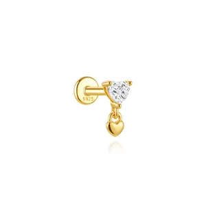 Detailed macro view of S925 gold-plated sterling silver heart stud earring with dangle heart