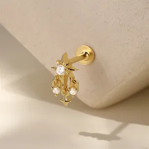 Detail of gold-plated S925 sterling silver star tassel labret with sparkling cubic zirconia