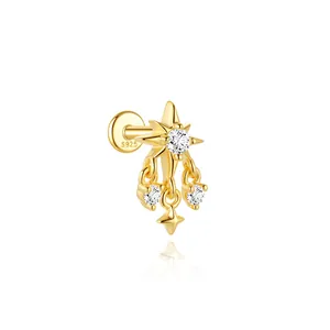 Macro view of gold-plated S925 silver eight-pointed star stud earring with zircon accents