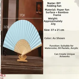 Detail view of light blue DIY paper folding fan with measurements and bamboo frame