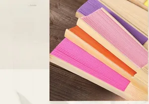 Close-up of colorful DIY 6-inch folding fans with natural bamboo frame for painting