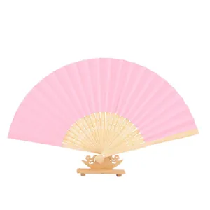Elegant pink blank folding fan featuring natural wooden ribs and a desktop display stand for DIY