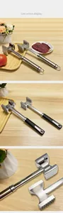 Close-up details of professional stainless steel meat tenderizer mallet heads for steak