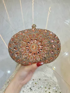 Elegant full diamond evening clutch bag with pink rhinestone flower pattern detail