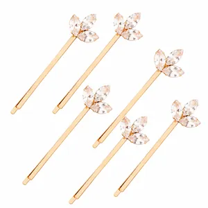 Set of six elegant gold-tone bobby pins featuring marquise cubic zirconia leaf accents