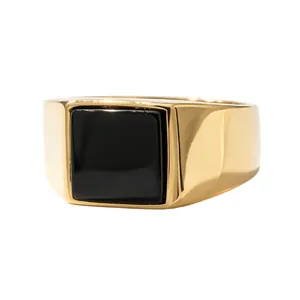 Fashionable golden titanium steel signet ring featuring a polished square black stone inlay.