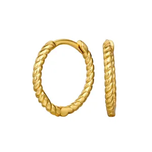 Close-up detail of golden S925 sterling silver twisted rope design hoop earrings