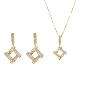 Geometric gold titanium steel jewelry set with sparkling CZ stones necklace and earrings
