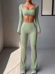 Close-up view of a Y2K style yoga set featuring a long sleeve crop top and flared leggings