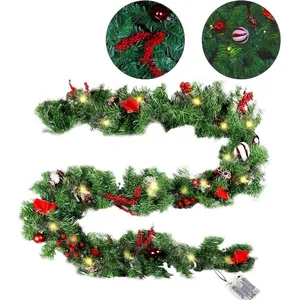Pre-lit Christmas garland with red berries and ornaments for festive decor
