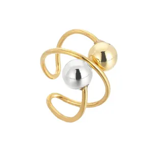 Modern minimalist stainless steel planet ring featuring gold and silver geometric beads