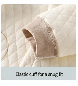 Close-up detail showing the high-elastic ribbed cuff of a quilted three-layer warm baby outfit