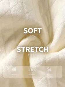 Detailed view of soft breathable quilted cotton fabric for baby thermal clothing