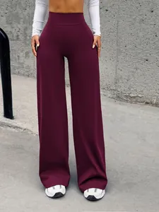 Eleganti pantaloni da yoga a gamba larga color rosso vino a vita alta per un look chic