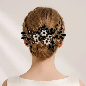 Elegant handmade wire floral hair comb with black leaves and white pearls for weddings