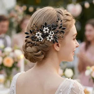 Vintage handmade floral hair comb with black rhinestones and pearls on bridal updo