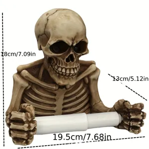 Detailed measurements of vintage resin skull wall-mounted toilet paper holder.