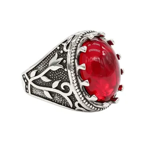 Bague baroque vintage en acier titane avec grand cabochon ovale en pierre rouge