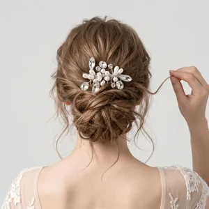 Elegant handmade bridal hair comb with pearls and rhinestones for wedding bun hairstyles