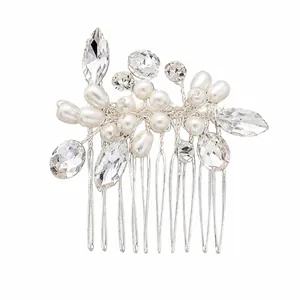 Handmade silver hair comb featuring elegant white pearls and sparkling clear crystals for weddings