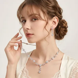 Elegant silver vine flower necklace and earring jewelry set for bridal wedding and photo shoots