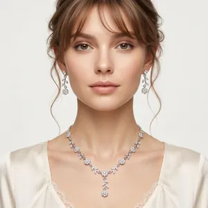 Elegant silver vine flower necklace and earring set for bridal jewelry photography