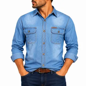 Close-up detail of men's vintage light blue denim work shirt with dual chest pockets