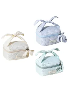 Fresh floral embossed mini cosmetic bag with bow handle in three colors