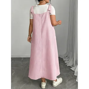 Back view of a plus-size pink and white striped summer suspender maxi dress