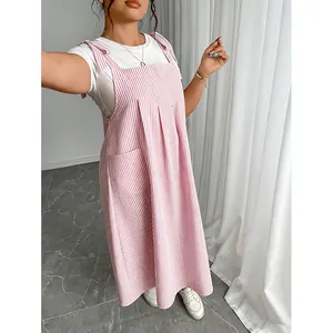 Stylish pink and white vertical striped overall dress with adjustable shoulder bow straps