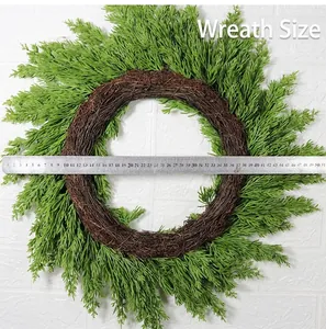 Detailed measurement of a green pine needle Christmas wreath with natural vine base