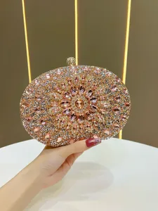 Detailed macro view of luxury sunflower rhinestone evening clutch bag with crystals.