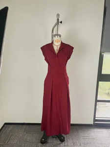 Elegant burgundy summer dress with lapel V-neck and cap sleeves shown on a mannequin