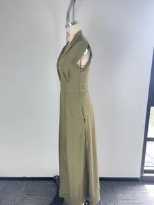 Side profile view of an elegant olive green stand collar maxi dress with cap sleeves on a mannequin.
