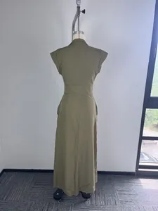 Back view of elegant olive green maxi dress with cap sleeves on mannequin
