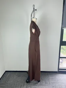 Detailed side view of an elegant dark brown cap sleeve maxi dress with stand collar